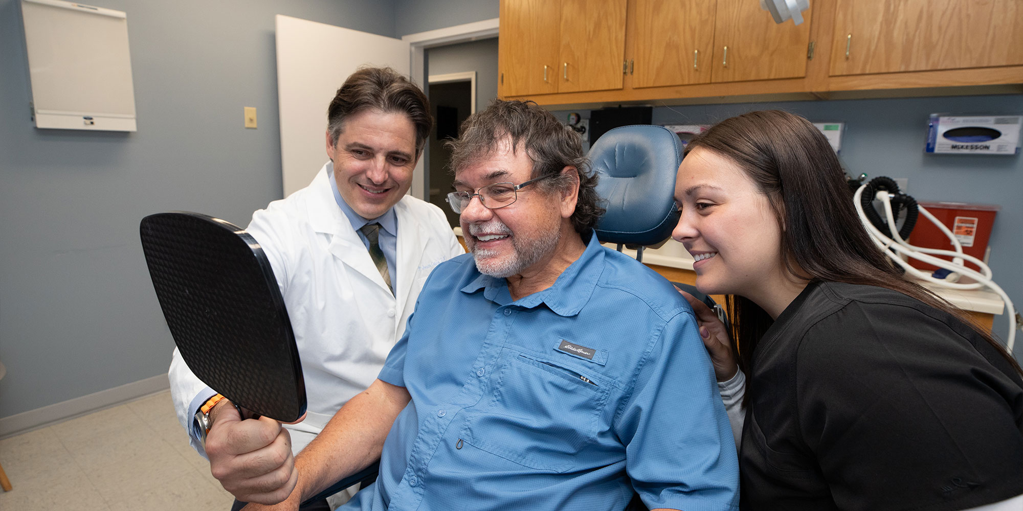 patient smiling after their dental procedure